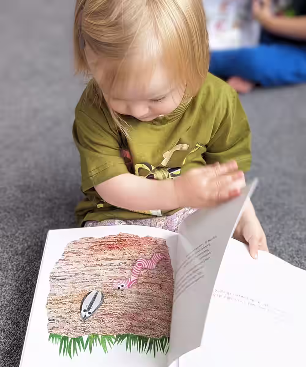 reading the Grow Tall Sid book